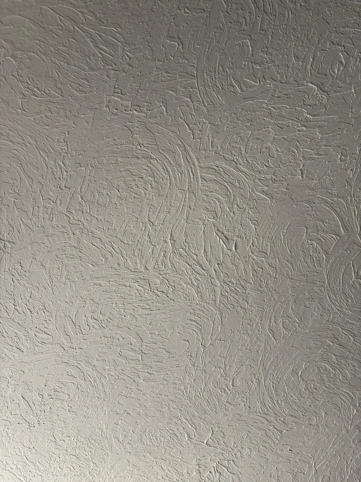 Close-up of swirl wall texture completed by KC Drywall